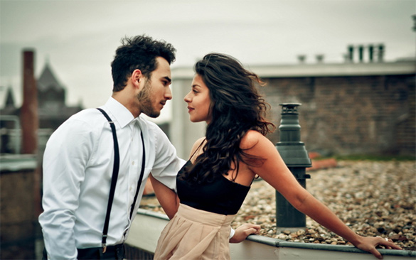 woman-and-man-looking-at-each-other-on-the-roof